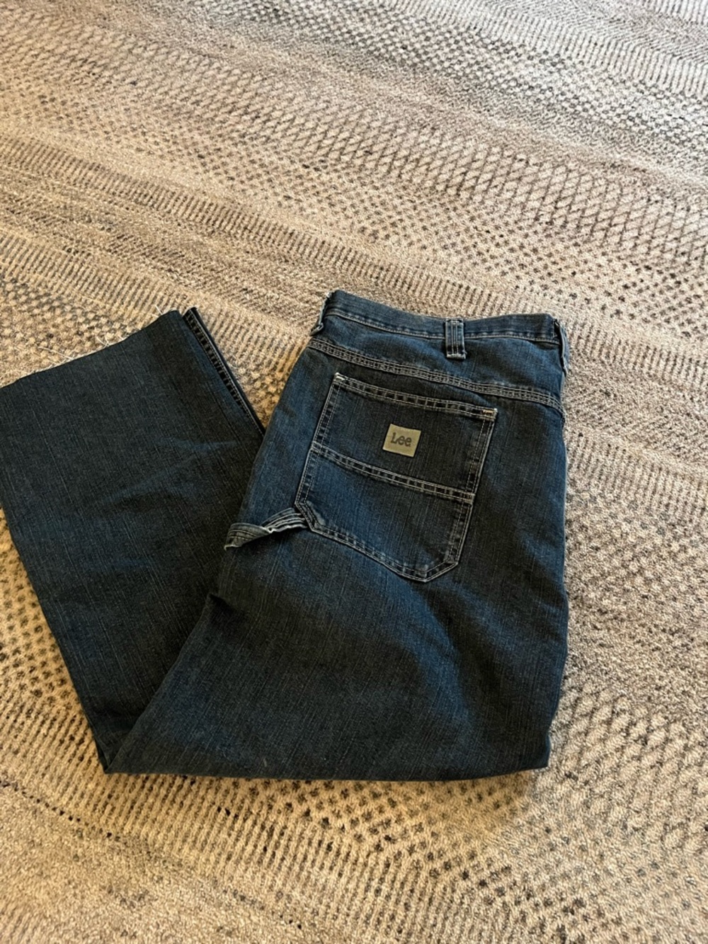 Lee Relaxed Fit Men's cut off carpenter Jeans in Dark Blue Denim with raw hem